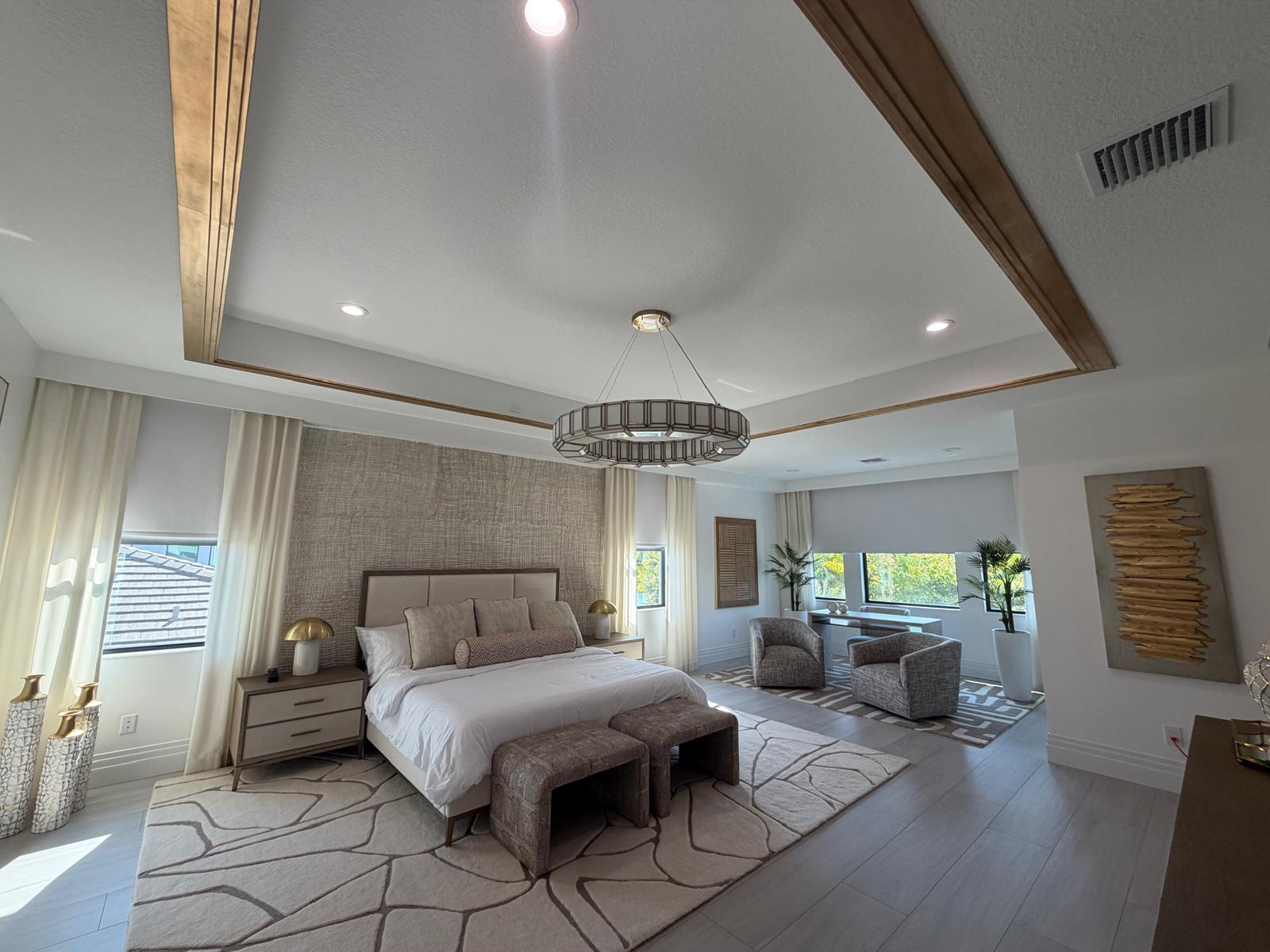 A stylish and inviting bedroom prepared for guests in a luxury rental.